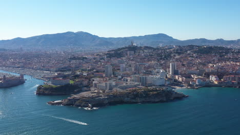 Large-aerial-back-traveling-view-of-Marseille-old-city-mediterranean-sea-sunny